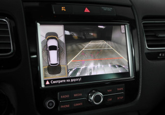 Подержанный автомобиль Volkswagen Touareg 2014 года (13 фото)