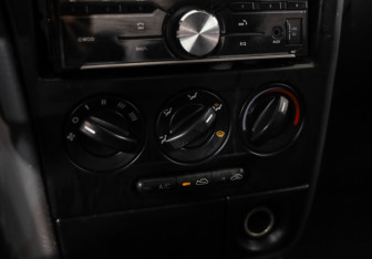 Подержанный автомобиль Kia Spectra Sedan 2007 года (12 фото)