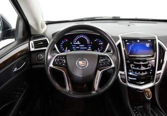 Подержанный автомобиль Cadillac SRX 2013 года (10 фото)
