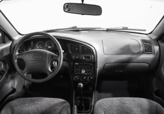 Подержанный автомобиль Kia Spectra Sedan 2007 года (9 фото)