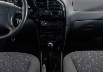 Подержанный автомобиль Kia Spectra Sedan 2008 года (12 фото)