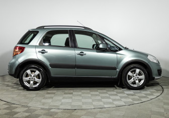 Подержанный автомобиль Suzuki SX4 Hatchback 2012 года (4 фото)