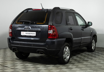 Подержанный автомобиль Kia Sportage 2010 года (5 фото)