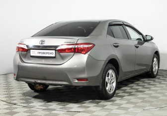 Подержанный автомобиль Toyota Corolla Sedan 2014 года (5 фото)