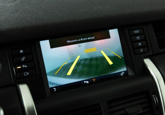 Подержанный автомобиль Land Rover Discovery Sport 2015 года (18 фото)