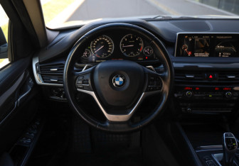 Подержанный автомобиль BMW X6 2015 года (8 фото)
