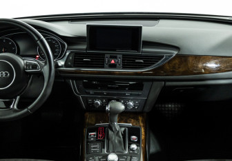 Подержанный автомобиль Audi A6 Sedan 2014 года (14 фото)
