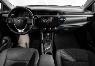 Подержанный автомобиль Toyota Corolla Sedan 2014 года (14 фото)
