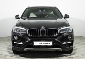 Подержанный автомобиль BMW X6 2016 года (3 фото)
