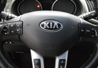 Подержанный автомобиль Kia Sportage 2014 года (15 фото)