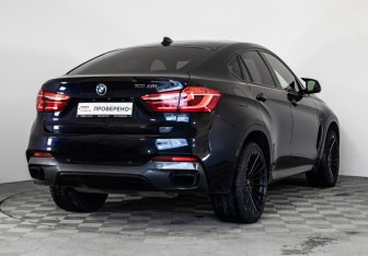 Подержанный автомобиль BMW X6 2015 года (6 фото)