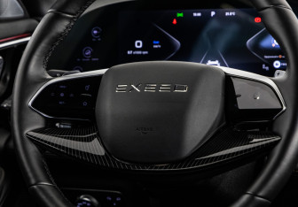 Подержанный автомобиль Exeed TXL 2023 года (12 фото)