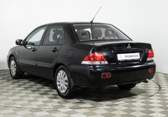 Подержанный автомобиль Mitsubishi Lancer Sedan 2009 года (7 фото)