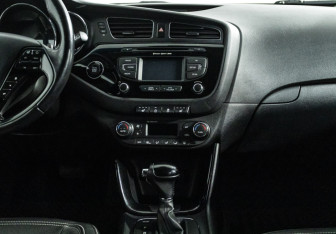 Подержанный автомобиль Kia Ceed Wagon 2015 года (14 фото)