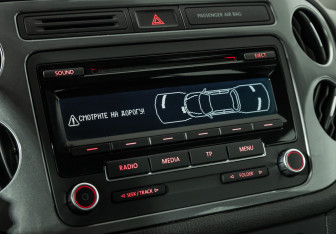 Подержанный автомобиль Volkswagen Tiguan 2014 года (15 фото)
