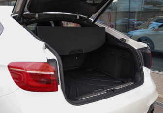 Подержанный автомобиль BMW X6 2018 года (24 фото)