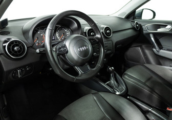 Подержанный автомобиль Audi A1 2012 года (11 фото)