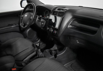Подержанный автомобиль Kia Sportage 2008 года (14 фото)