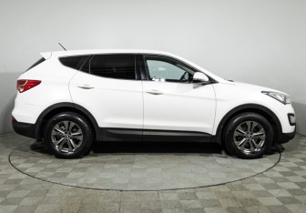 Подержанный автомобиль Hyundai Santa Fe 2015 года (4 фото)