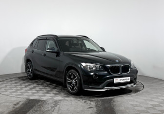 Подержанный автомобиль BMW X1 2014 года (3 фото)