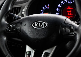 Подержанный автомобиль Kia Sportage 2011 года (12 фото)
