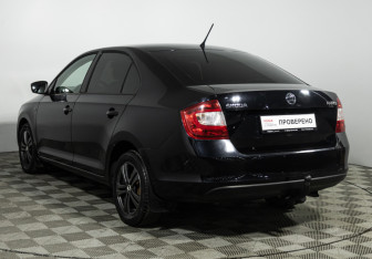Подержанный автомобиль Skoda Rapid Liftback 2014 года (7 фото)