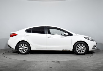 Подержанный автомобиль Kia Cerato Sedan 2013 года (4 фото)