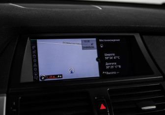 Подержанный автомобиль BMW X5 2010 года (15 фото)