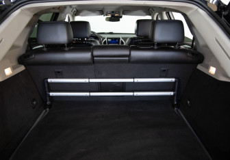 Подержанный автомобиль Cadillac SRX 2013 года (32 фото)