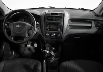 Подержанный автомобиль Kia Sportage 2009 года (14 фото)