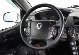 Подержанный автомобиль SsangYong Kyron 2012 года (14 фото)