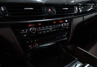 Подержанный автомобиль BMW X6 M 2015 года (23 фото)