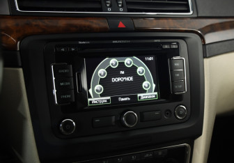 Подержанный автомобиль Skoda Superb Liftback 2012 года (12 фото)