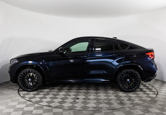 Подержанный автомобиль BMW X6 2015 года (10 фото)