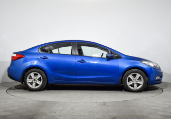Подержанный автомобиль Kia Cerato Sedan 2014 года (4 фото)