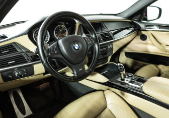 Подержанный автомобиль BMW X6 M 2011 года (11 фото)