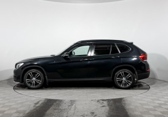 Подержанный автомобиль BMW X1 2014 года (8 фото)