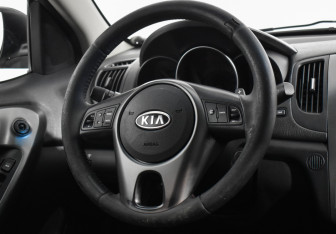 Подержанный автомобиль Kia Cerato Sedan 2011 года (14 фото)