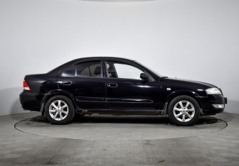 Подержанный автомобиль Nissan Almera Classic 2008 года (4 фото)