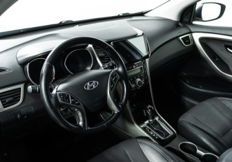 Подержанный автомобиль Hyundai i30 Hatchback 2015 года (11 фото)