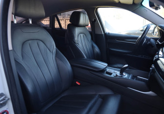 Подержанный автомобиль BMW X6 2015 года (9 фото)