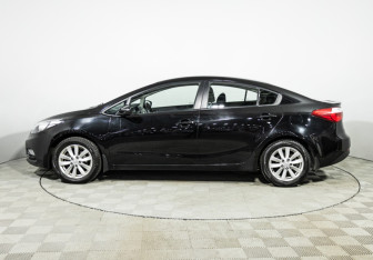 Подержанный автомобиль Kia Cerato Sedan 2013 года (8 фото)