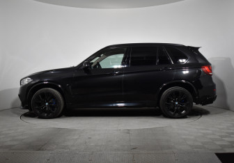 Подержанный автомобиль BMW X5 2014 года (8 фото)