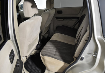 Подержанный автомобиль Nissan X-Trail 2003 года (12 фото)