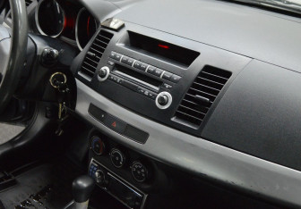 Подержанный автомобиль Mitsubishi Lancer Sedan 2008 года (11 фото)