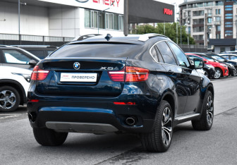 Подержанный автомобиль BMW X6 2013 года (6 фото)