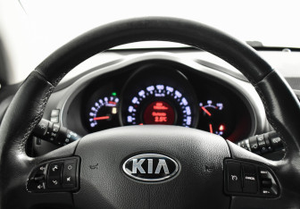 Подержанный автомобиль Kia Sportage 2013 года (15 фото)