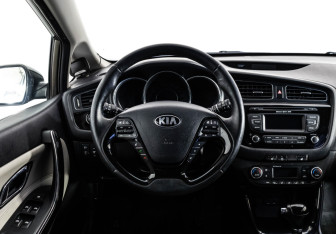Подержанный автомобиль Kia Ceed Hatchback 2014 года (12 фото)
