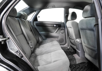 Подержанный автомобиль Daewoo Gentra Sedan 2013 года (15 фото)