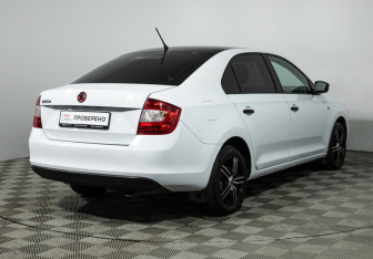 Подержанный автомобиль Skoda Rapid Liftback 2014 года (5 фото)